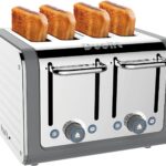 Dualit DA4526 4 Slot Architect Toaster Grey with toast popping out.