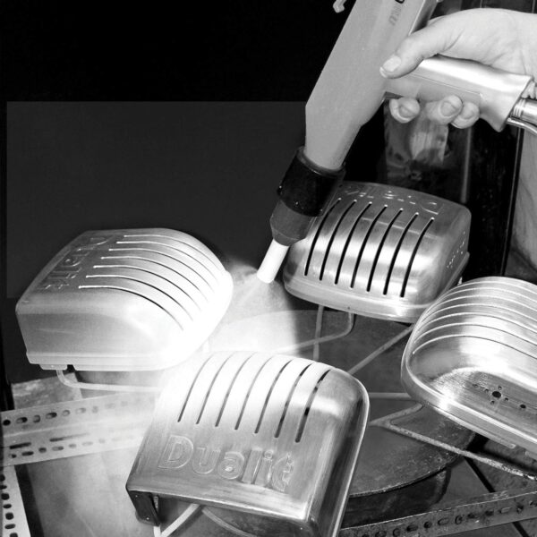 Person using a laser engraver on Dualit DA0144 6 Slice Vario Toasters.