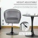 Homcom Grey Fabric Swivel Bar Stool with Adjustable Height Shown Next to a Modern Black Table