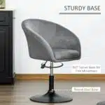 Homcom Grey Fabric Swivel Bar Stool with a Sturdy Round Steel Base Displayed in a Modern Kitchen Setting