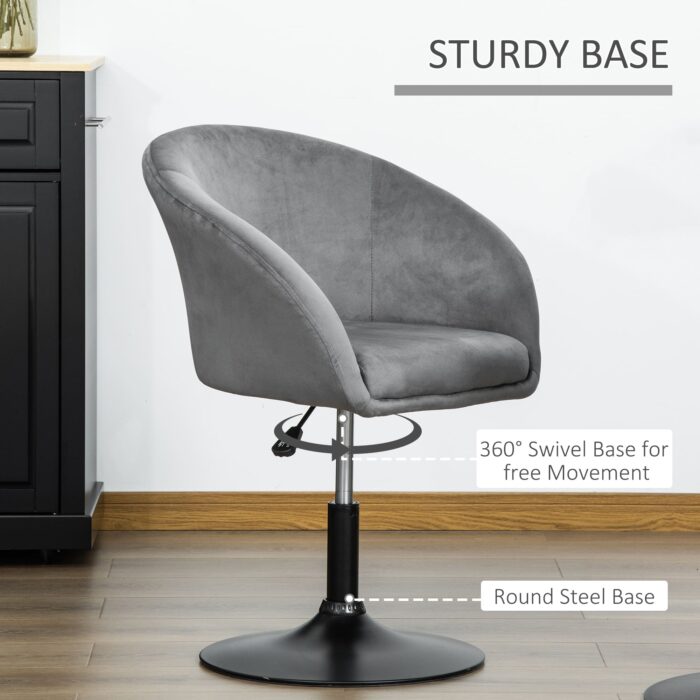 HOMCOM grey fabric swivel bar stool with a sturdy round steel base, displayed in a modern kitchen setting.